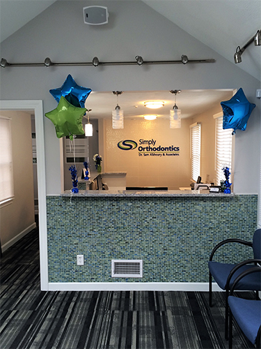 Welcoming orthodontist office reception desk