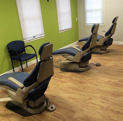 Row of orthodontic treatment chairs