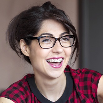 Laughing woman with traditional braces