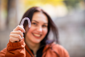 an Invisalign patient smiling confidently